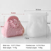 A silicone mold for candle and soap making shaped like a pink rose, with dimensions 10.5cm by 7.2cm by 9cm.