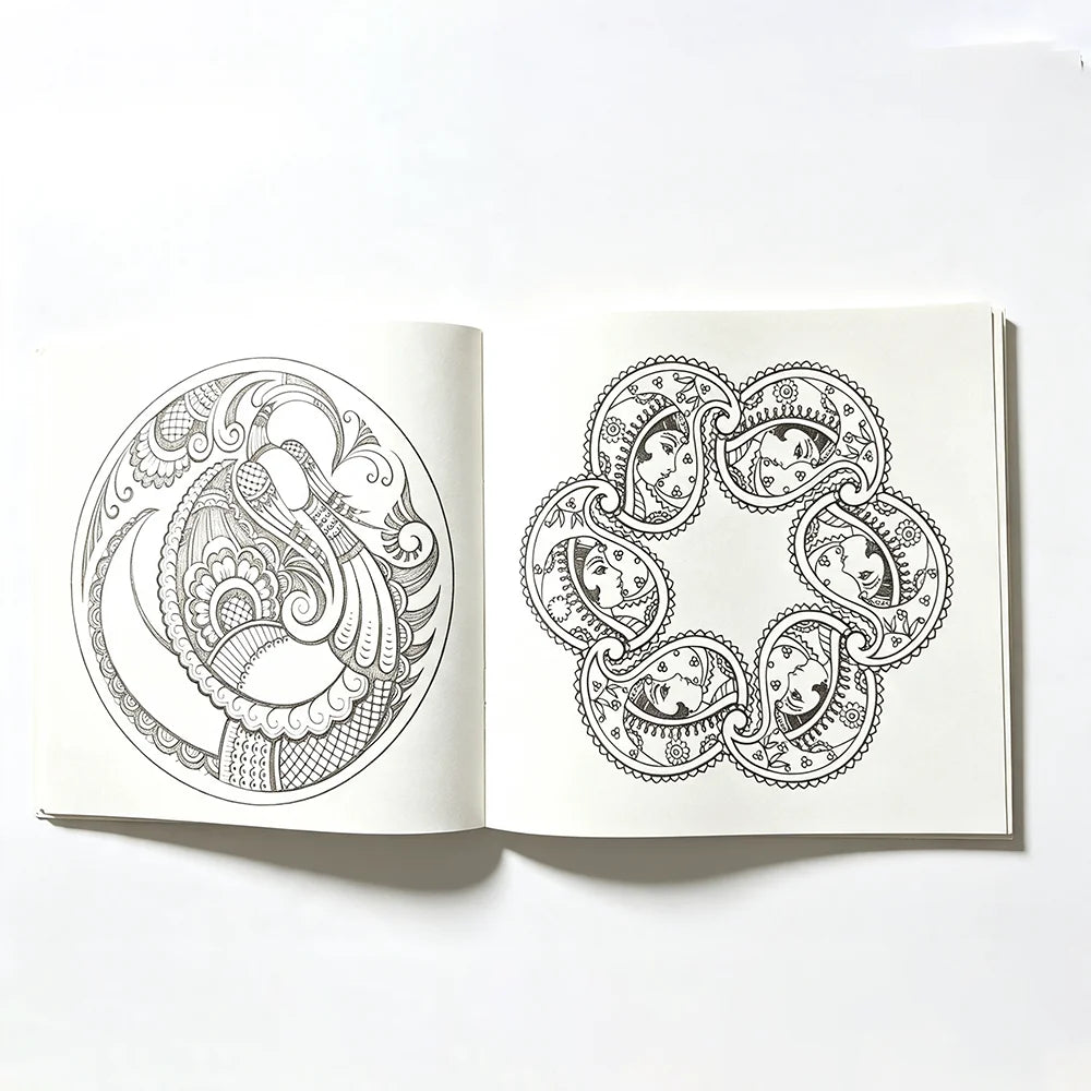 Two detailed black and white mandala designs on a page from a coloring book.