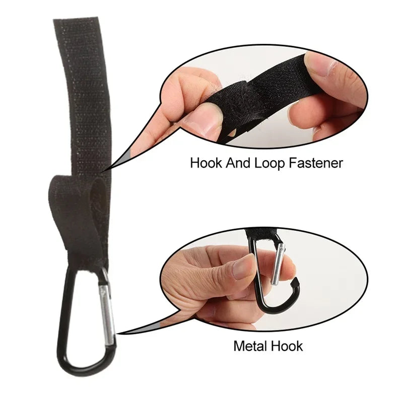 Close-up views of a black hook and loop fastener and a metal hook used for stroller accessories