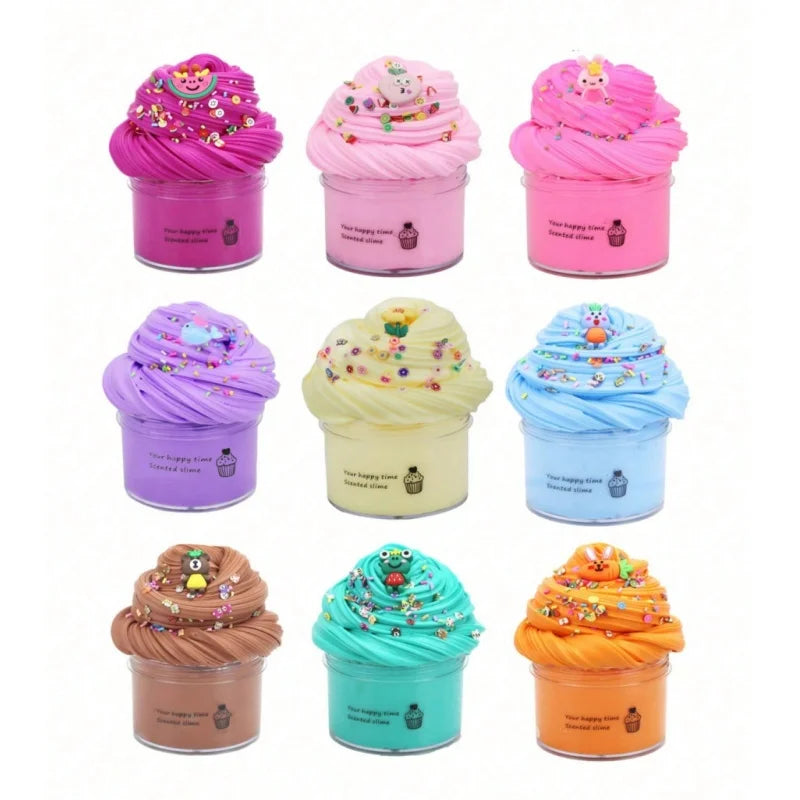 A set of eight colorful slime containers decorated with various cake themes and sprinkles.