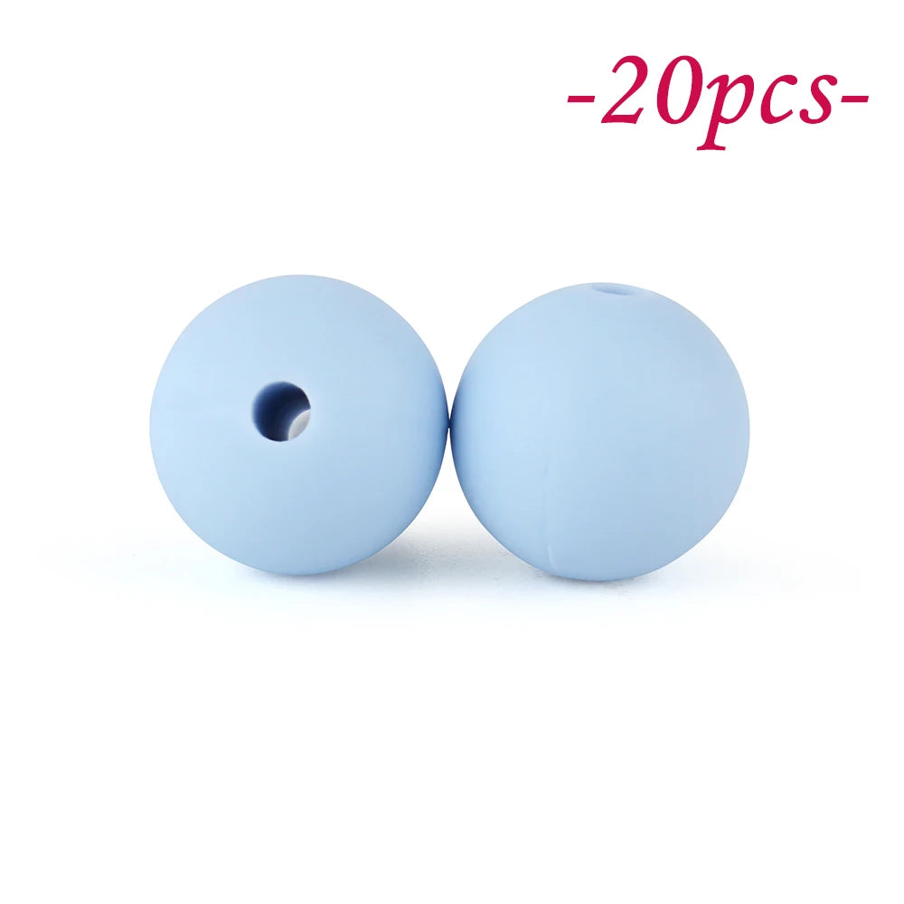 Two light blue silicone beads are shown against a white background, indicating a set of 20 pieces.