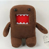 A brown plush toy shaped like a bear with a red mouth showing white teeth.