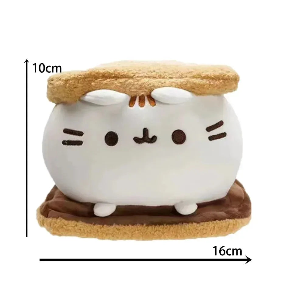 A white plush cat doll with orange ears and a brown base, shown against a measurement scale.