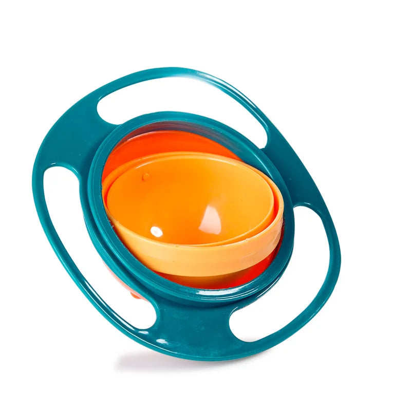 A teal splash-proof gyro bowl with an orange lid and a handle, designed for kids and adults.