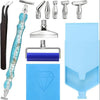 A complete diamond painting tool kit showing precision pens, various tools, and a blue plastic frame.