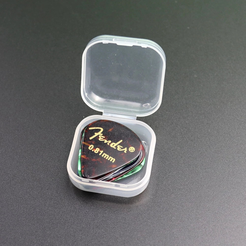 A clear plastic storage box containing a variety pack of Fender guitar picks, measuring 0.81mm.