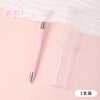 A pink gradient rotating dotting pen is shown next to its clear storage case.