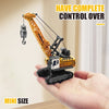 A hand holds a mini RC excavator toy with a yellow body and hydraulic arm, demonstrating complete control.