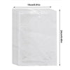A sheet of clear adhesive sticker material covered in small, evenly spaced white polka dots.
