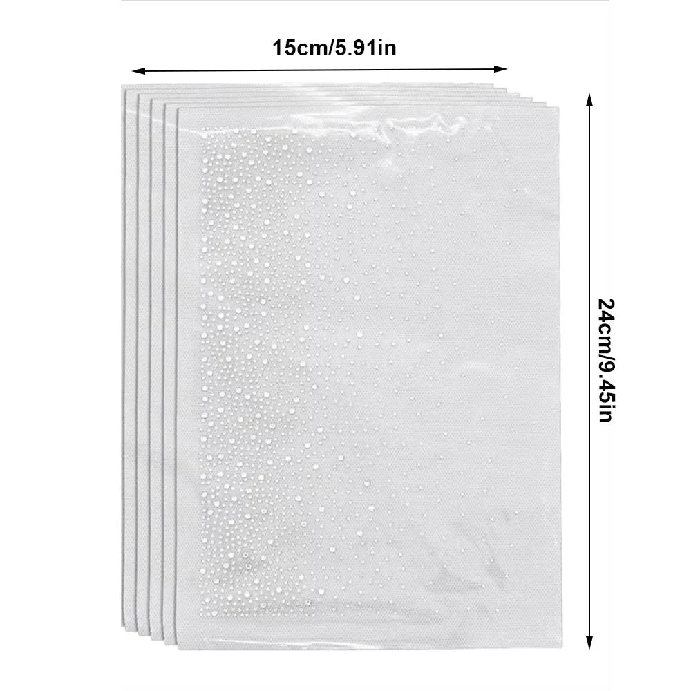 A sheet of clear adhesive sticker material covered in small, evenly spaced white polka dots.