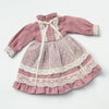 A vintage lace maid dress set for 1/6 scale dolls in dusty rose pink with white lace trim.