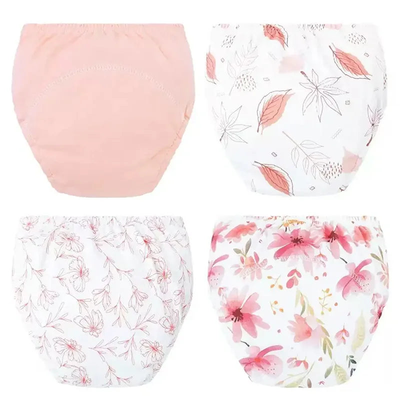 A set of four reusable cotton potty training pants for toddlers in various floral patterns.