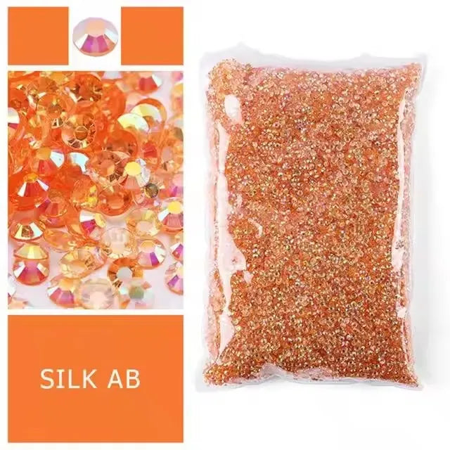 Bag of orange silk ab resin rhinestones for crafts and DIY projects