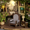 A wooden miniature dollhouse kit featuring furniture and lighting elements displayed on a shelf.