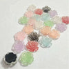 A collection of 50 small, colorful rose-shaped resin flatback flowers in various shades of pink, purple, and green.