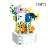 A set of 179 plastic building blocks shaped like a rose flower bouquet featuring purple and blue animals.