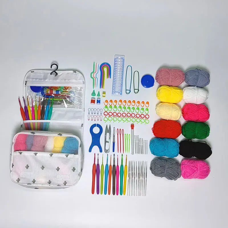 A complete crochet kit with yarn, hooks, and accessories laid out on a white background.
