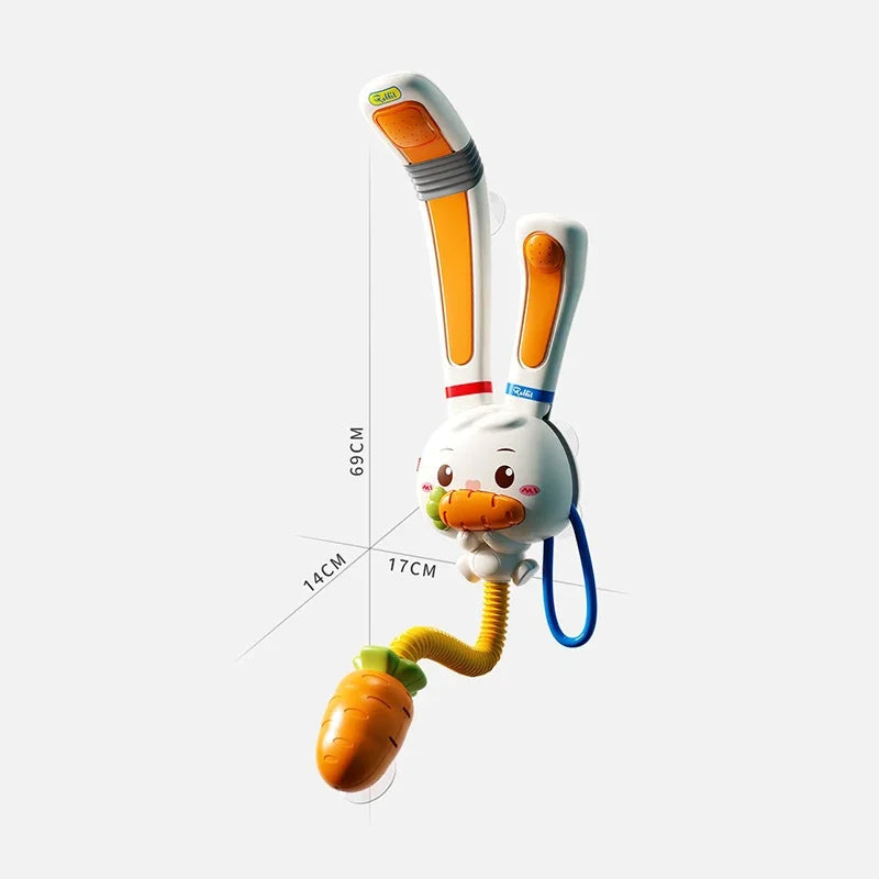 An orange rabbit bath toy with an adjustable water sprinkler, featuring a carrot body and a blue hose.