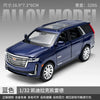 A blue 1:32 scale diecast model of a Cadillac Escalade SUV with a glass roof.