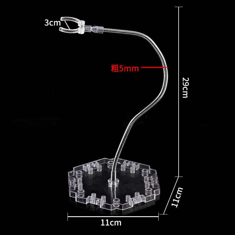 A clear adjustable snake bone stand with a 3cm length and 5mm thickness, designed for action figures and models.