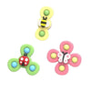 A set of three colorful baby bath toys featuring suction cup spinners shaped like an insect and a flower.