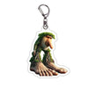 Acrylic keychain featuring a design of a monkey's feet surrounded by green foliage.