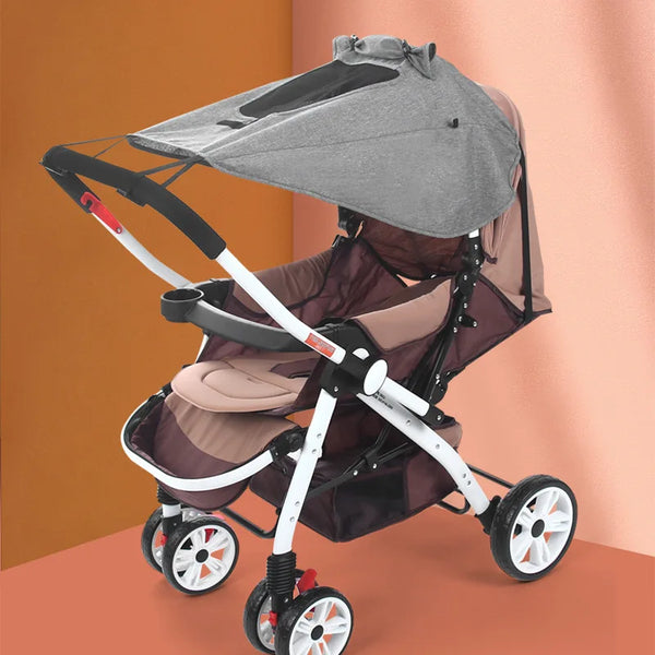 A gray universal baby stroller with a sun shade canopy is shown against an orange background.