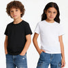 A boy and a girl model wearing white and black t-shirts and denim jeans.