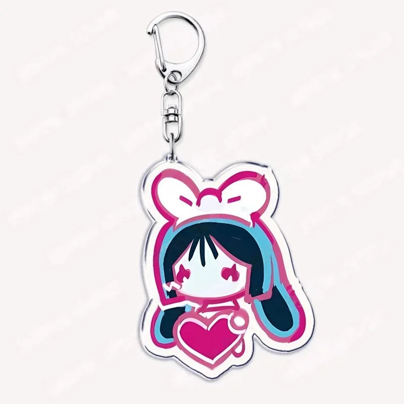 Silver acrylic keychain featuring a chibi girl with pink hair and large ears.