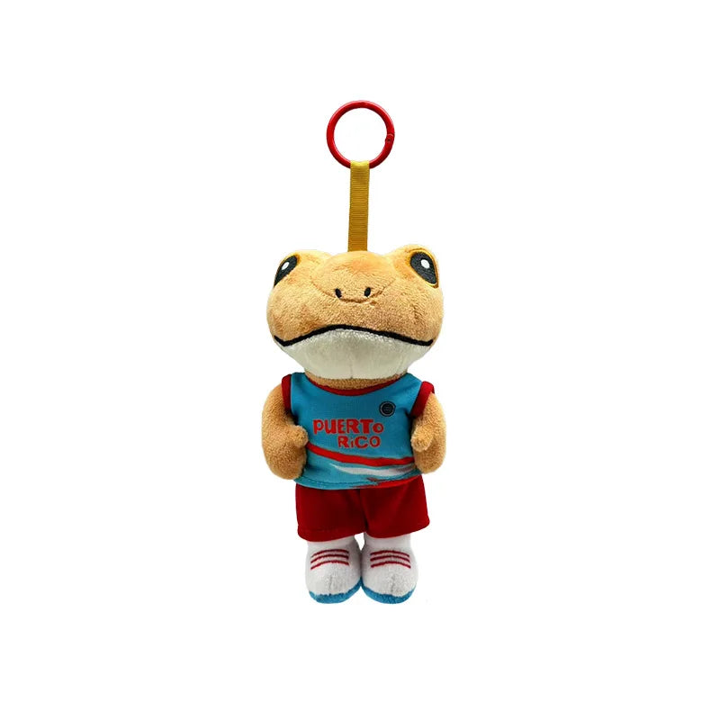 A cute plush frog doll with a red hoop and blue shirt is shown.