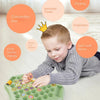 A young child is playing an Animal Flip Chess Memory Matching Game on a light wooden floor.