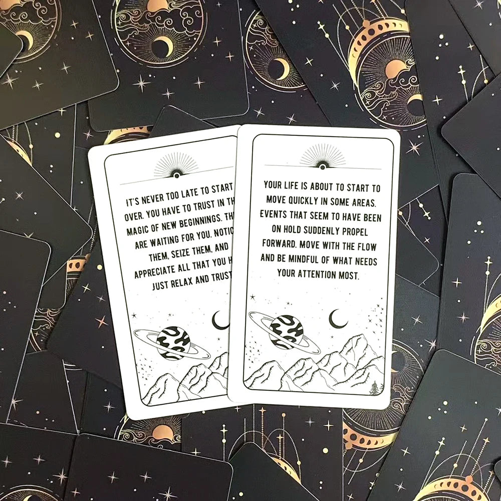An open oracle card shows text about starting new beginnings and moving quickly in some areas against a dark background.