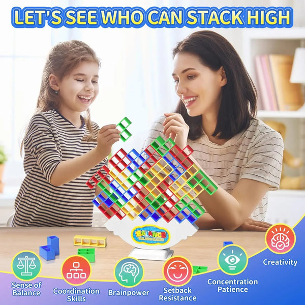 Two people building a tall structure with multi-sized colored blocks demonstrating balance and coordination skills