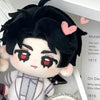 A black-haired plush character with large red eyes and a white outfit is displayed on a white background.