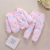 Pink fleece jacket and pants set for baby with a light blue cartoon print