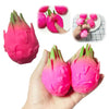 Pink dragon fruit squishy toys are shown in various forms and colors, including a large hand-shaped item.