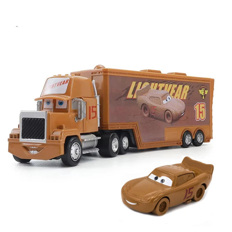 A diecast toy hauler truck modeled after Lightning McQueen, painted orange and brown.