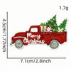 A red Christmas truck iron-on patch featuring festive greenery and holiday text on a white background.