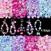 A colorful mix of acrylic beads in pink, purple, and blue for DIY jewelry making.