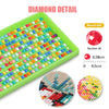 A diamond painting kit featuring colorful beads arranged in a green tray with round drill and section details.