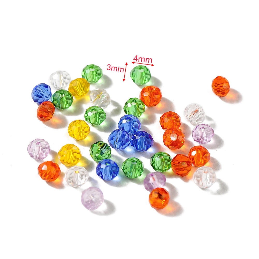 Assortment of faceted rondelle glass beads in various colors including green, yellow, blue, and orange.