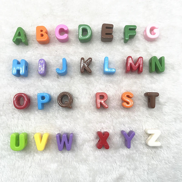 A set of 26 mixed alphabet letter beads in various colors and sizes for DIY jewelry making