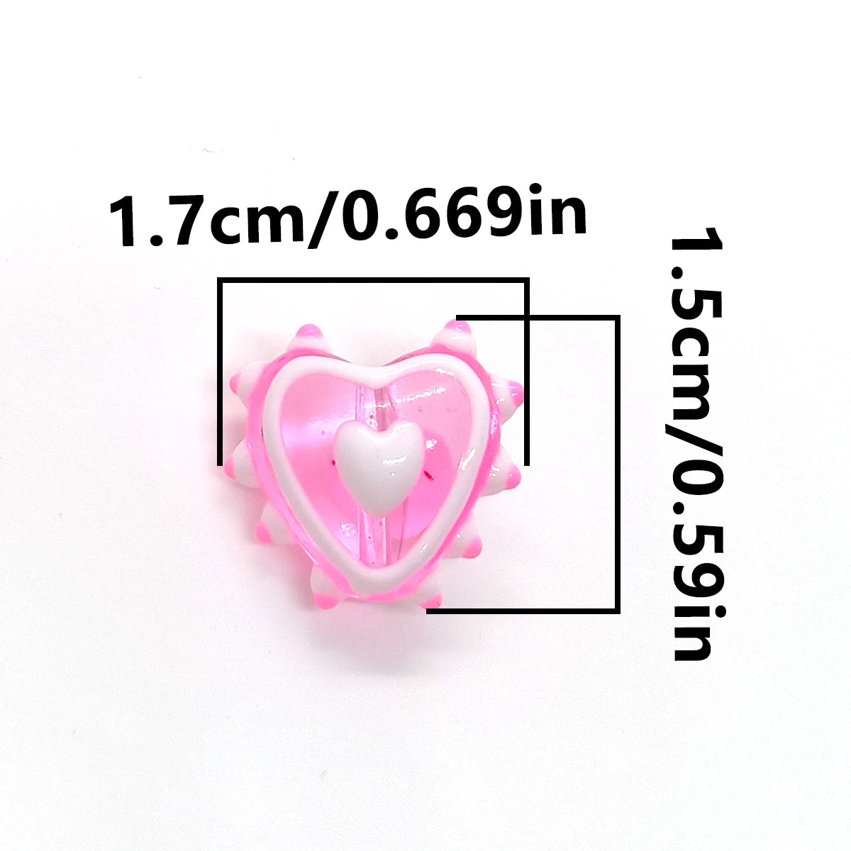 Pink lampwork glass beads shaped like hearts used for jewelry making