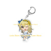 Chibi acrylic keychain of a blonde anime character with yellow flowers and a blue bow.