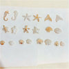 A collection of acrylic bead mixes shaped like various ocean animals including a seahorse, starfish, and seashells.