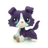 A purple and white Littlest Pet Shop style standing dog figure with large blue eyes.
