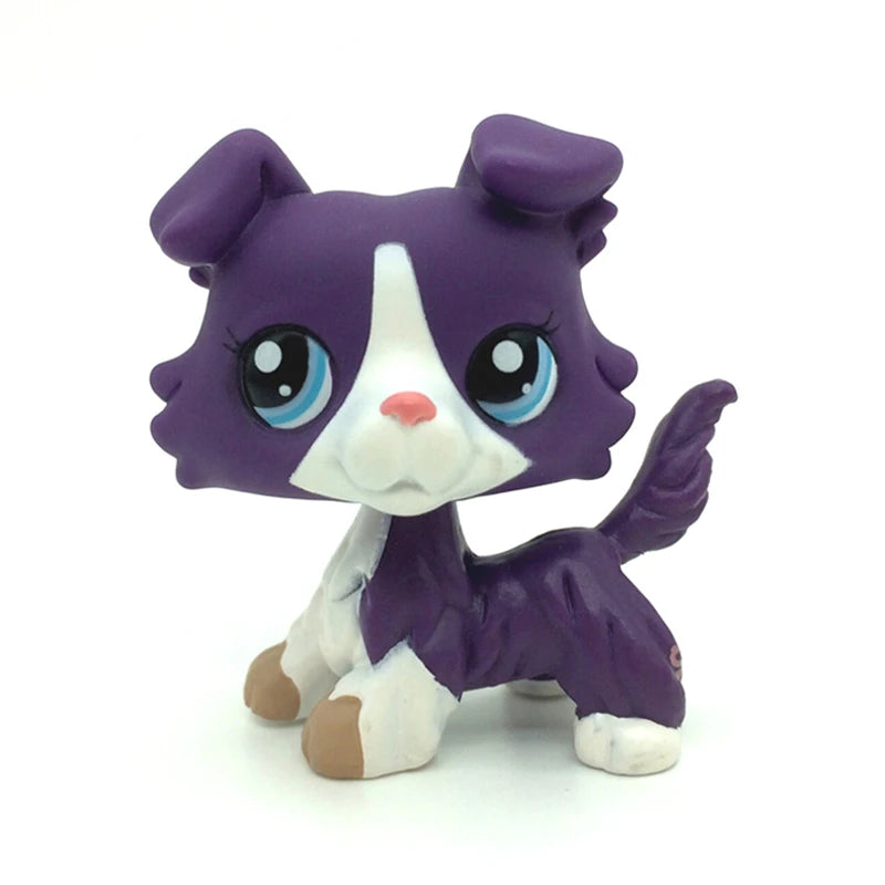 A purple and white Littlest Pet Shop style standing dog figure with large blue eyes.