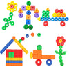 A set of colorful rainbow lacing beads and three strings used for Montessori threading practice.