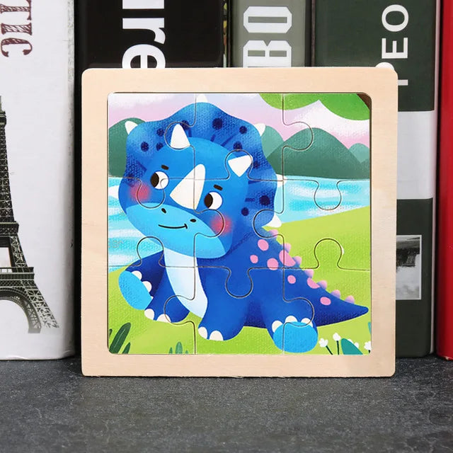 A wooden jigsaw puzzle featuring a blue dinosaur in a green landscape with blue water.