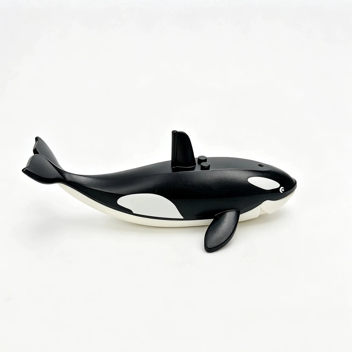 A black and white marine animal building block set featuring a shark, octopus, and whale.